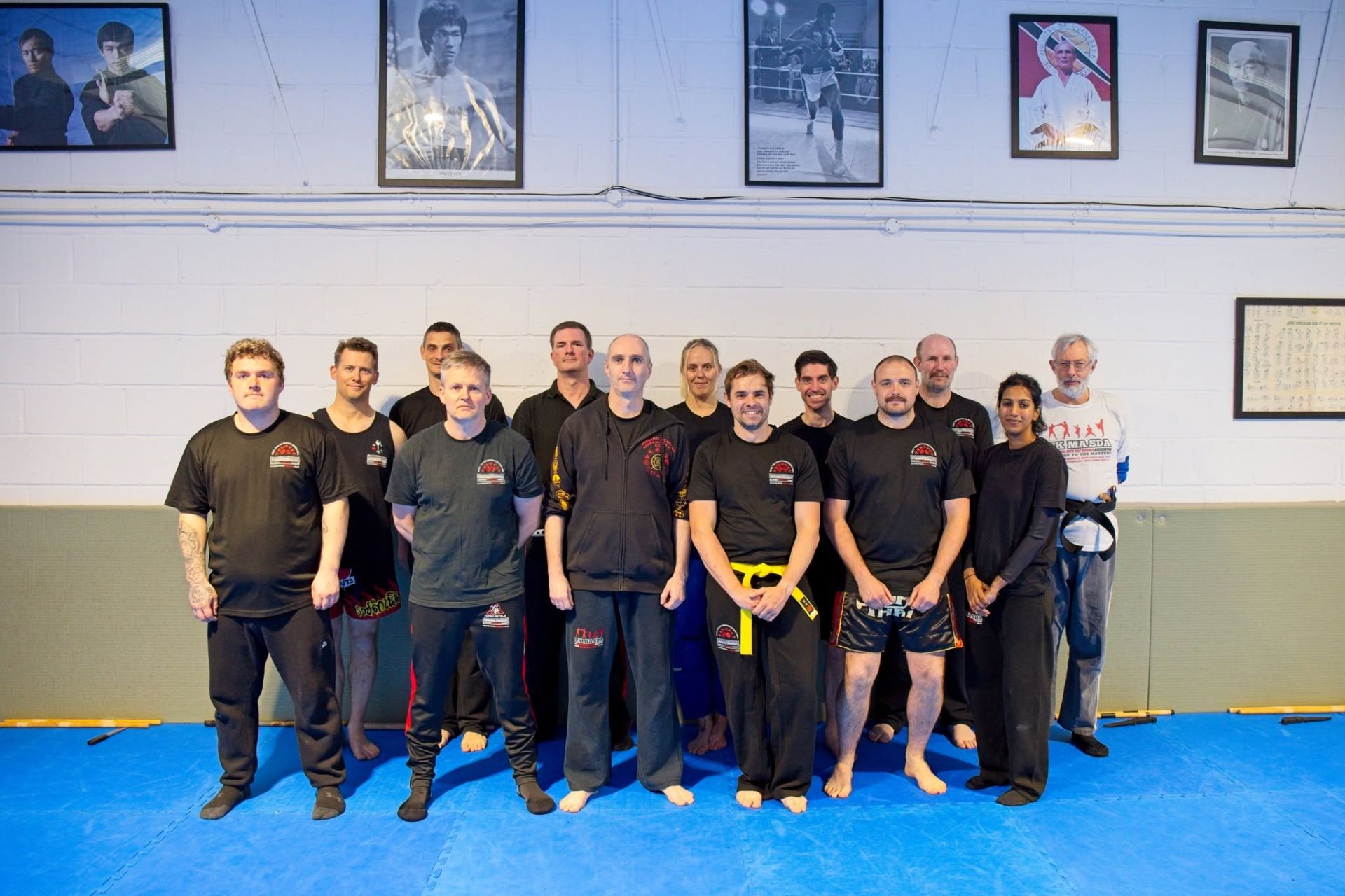 Group portrait on training mats