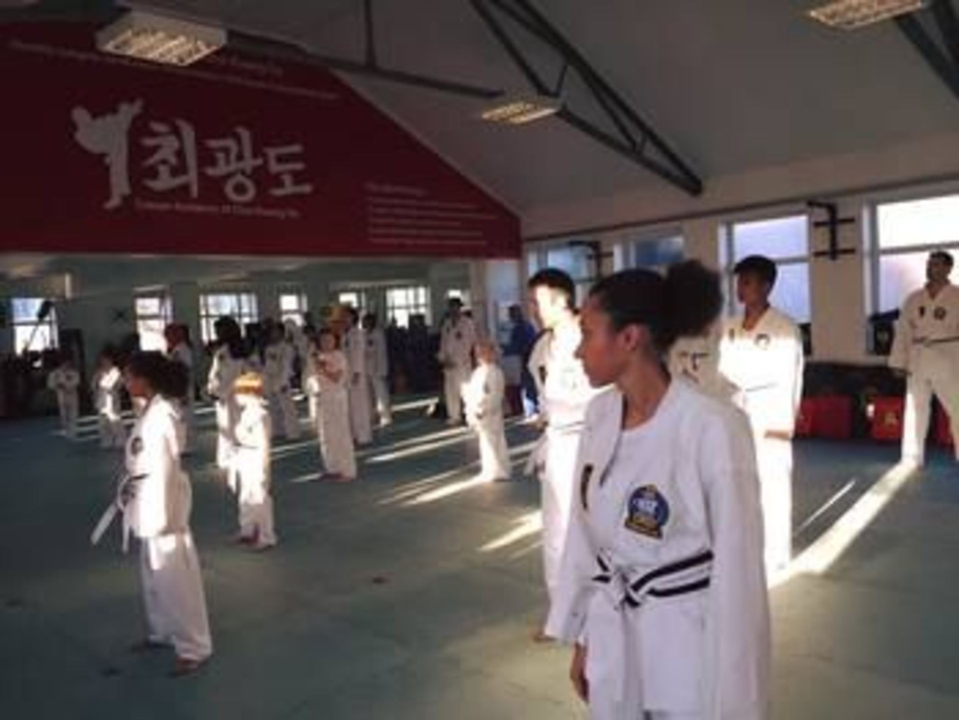 Teen Martial Arts class in bright studio